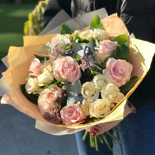 A combined bouquet of large and bush roses Early morning