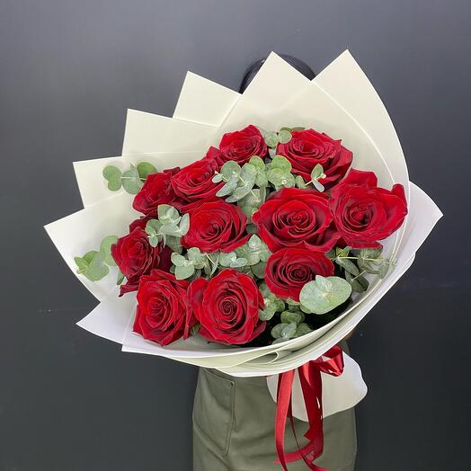 Bouquet of red roses and eucalyptus