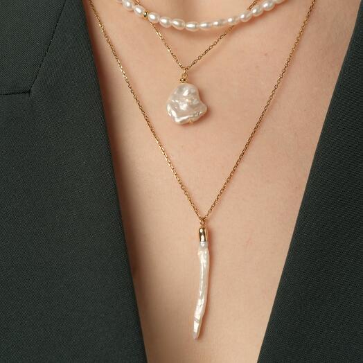 Тройное жемчужное ожерелье