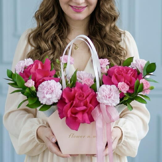 Lace bouquet of pink French roses, lace dianthus, hydrangea stabilized and ruskus in a pink handbag