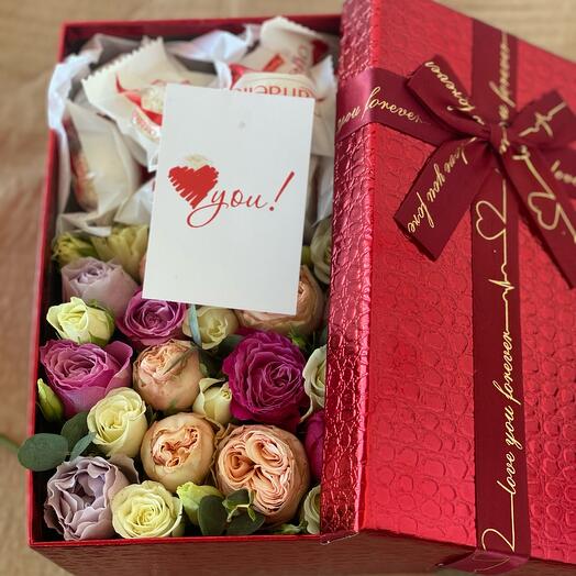 Flowers and sweets in a box