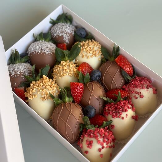 Chocolate-covered strawberries with fresh berries