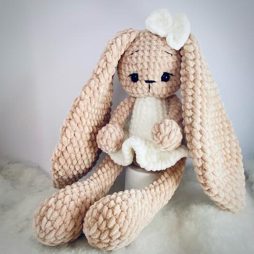 Conejito de peluche con arco de peluche