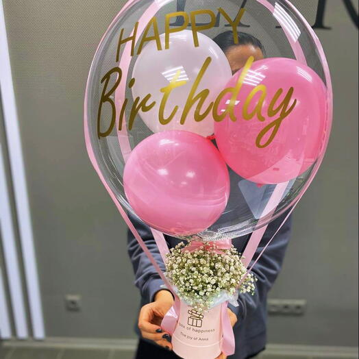 Flores en una Caja con una bola de burbujas