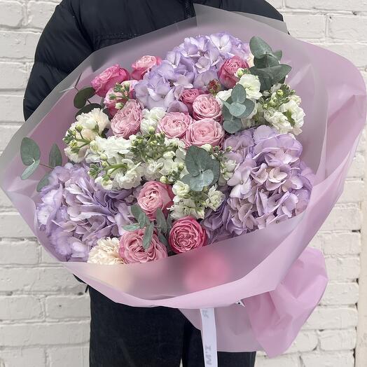 Bouquet of hydrangeas, bush roses and dianthuses