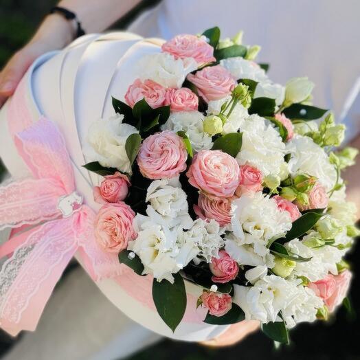 Flowers for the discharge of a girl from the hospital in a wheelchair