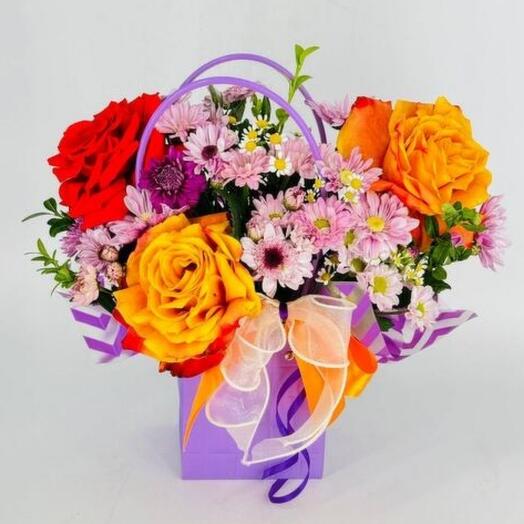 Handbag with flowers and orange French roses