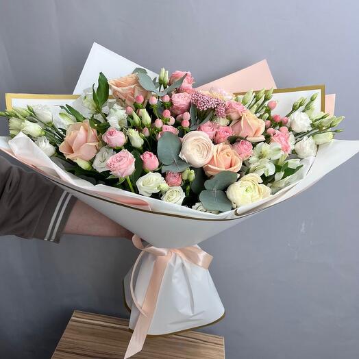 A large bouquet of roses and ranunculus