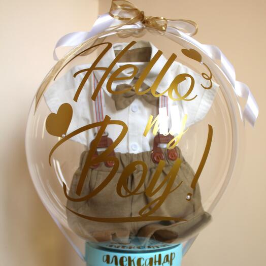 A bubble box with clothes for the birth of a boy