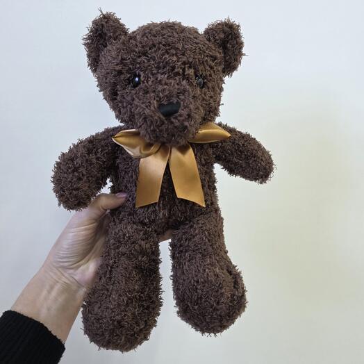 Игрушка плюшевый мишка с бантом