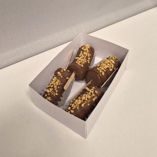 Бананы в шоколаде с дробленым арахисом