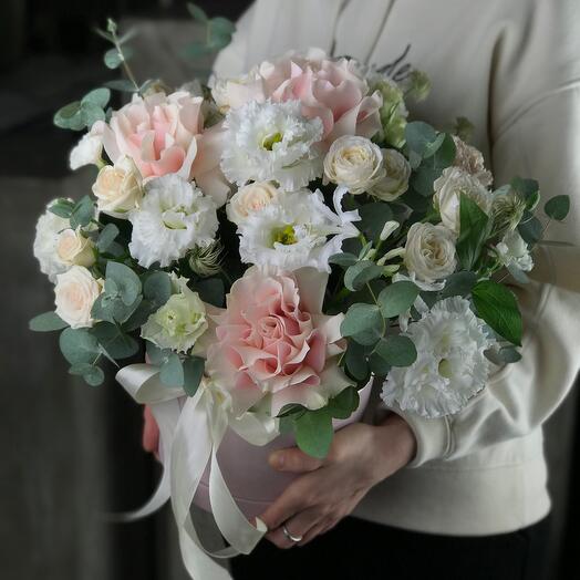 Flowers in a box French pink roses and bush roses