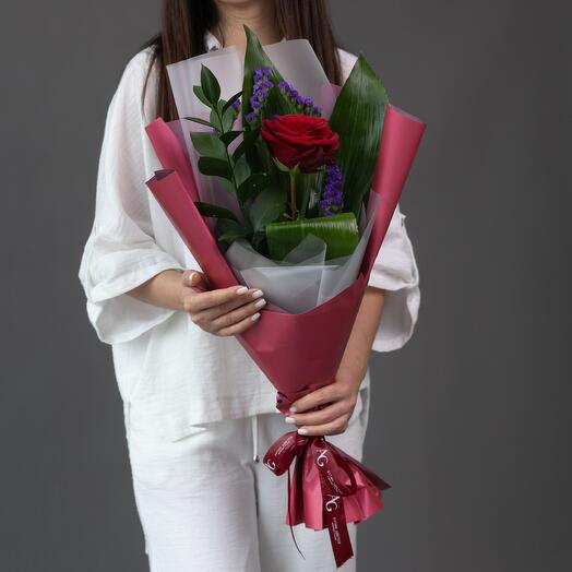 Tenderness and freshness: bouquet with Explorer rose, ruskus and bright aspedistra leaves