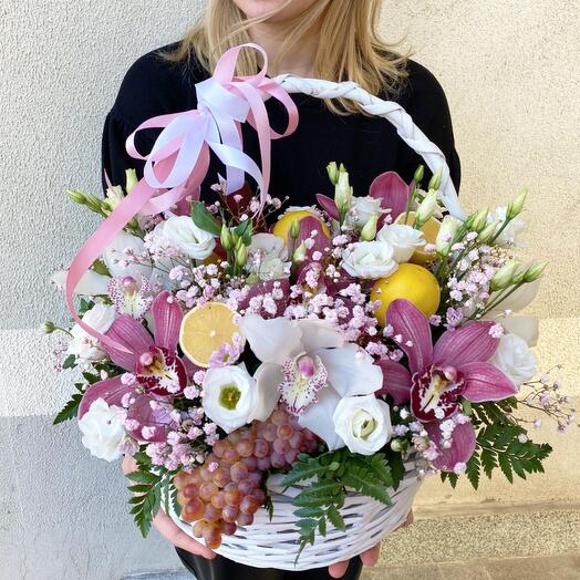 Basket with flowers and fruits