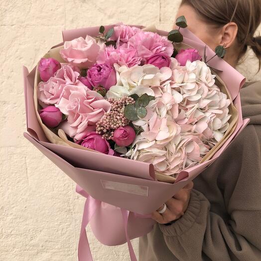 Bouquet of hydrangea, rose and rose and bush