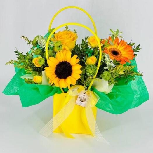 A handbag with sunflower flowers
