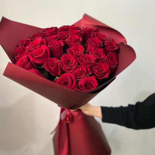 51 red roses in red wrapp