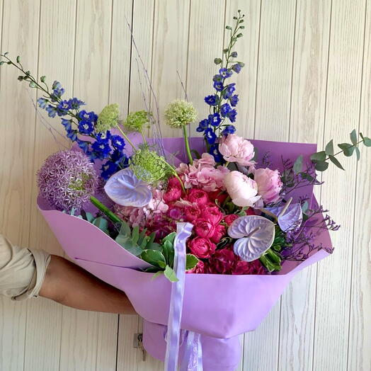 Purple Rain bouquet of delphiniums roses and hydrangeas