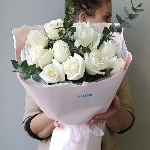 Bouquet with white roses and eucalyptus twigs