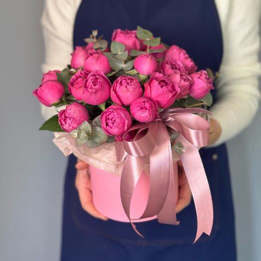 Rosas en forma de peonía en una Caja