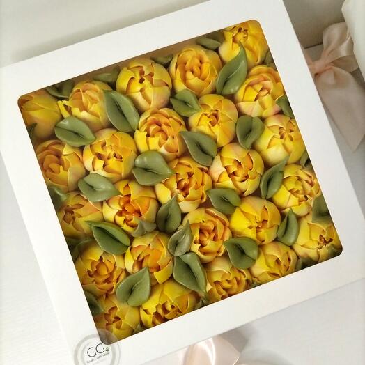A 20 by 20cm box of 25 medium-sized tulips