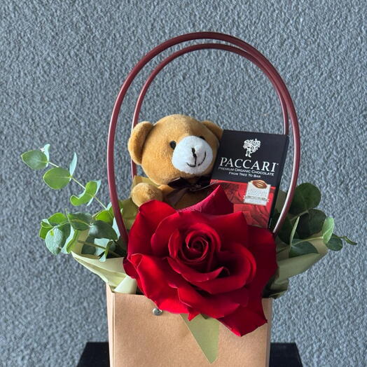 Rose in a box with chocolate