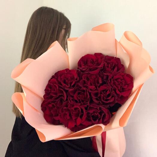 A bright bouquet of 11 red French roses