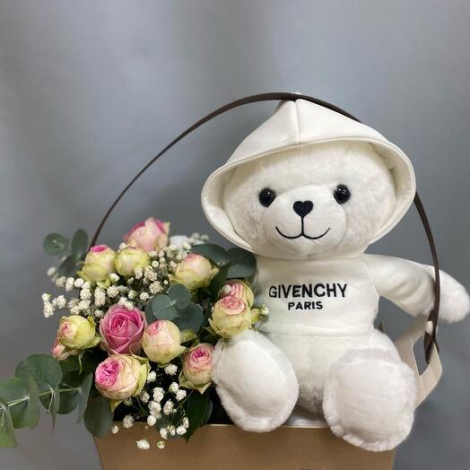 Bush roses with a teddy bear