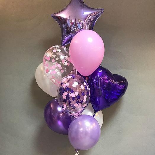 Arrangement of pink, lilac and purple balloons