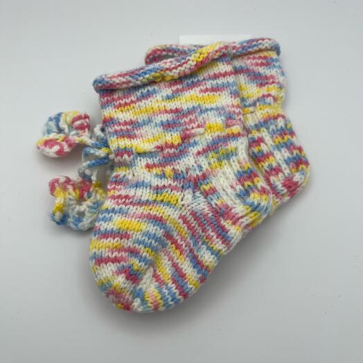 Вязанные носки пинетки в цвете единорога