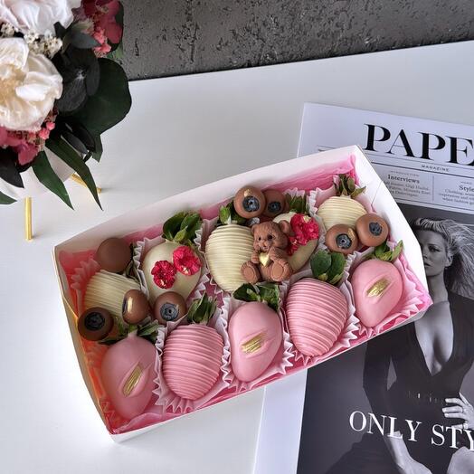Chocolate-covered strawberries. Gentle teddy bear