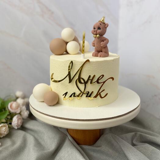 Минималистичный детский торт с шоколадной фигуркой