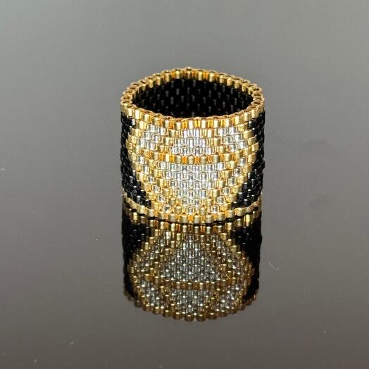 Ring with an ornament