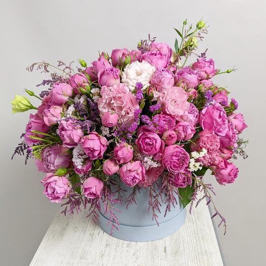 Composition with roses in a blue box