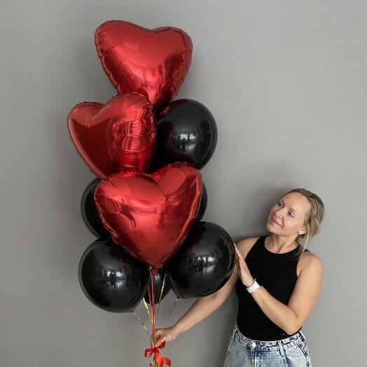 Helium balloons for a man or a girl in black with hearts