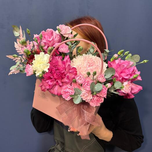 French roses with dianthuses in a bag
