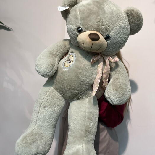 Медведь мягкий с бантом