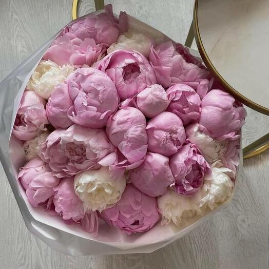 Bouquet of white and pink peonies