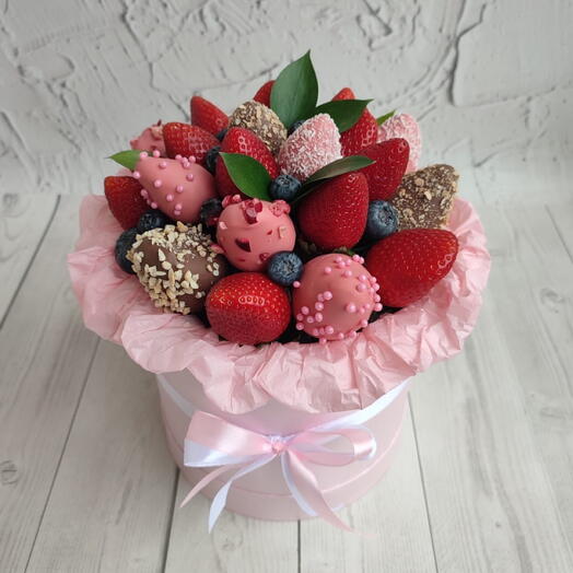 Chocolate-covered strawberries in a hatbox
