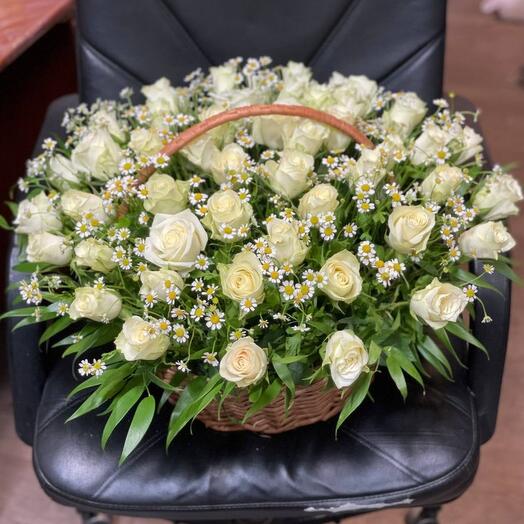 51 white roses with daisies in a basket