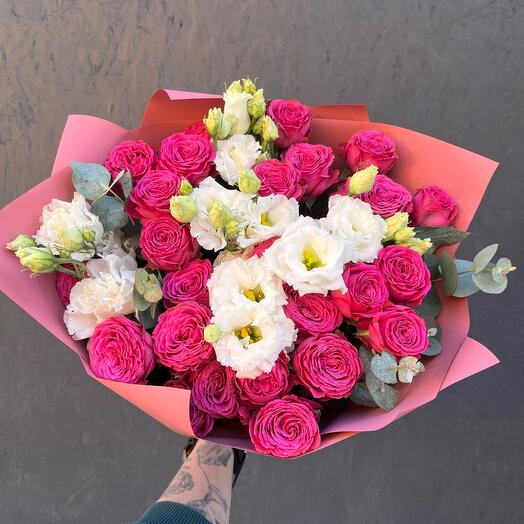 Bouquet of bushy peony-shaped roses, eustoma and eucalyptus