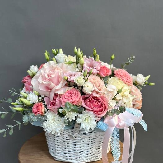 Flower arrangement in a basket of size M by March 8th