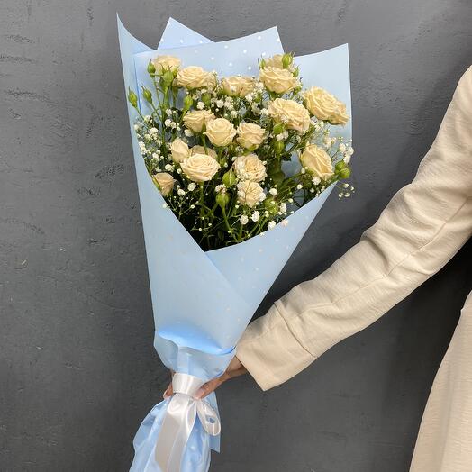 Delicate bouquet with a bush rose