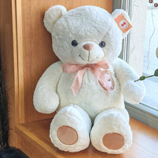 Белый медведь с розовым бантом