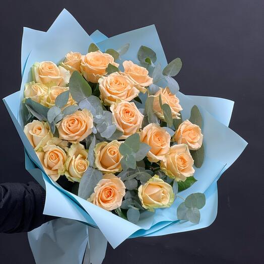 Bouquet of tea roses and eucalyptus