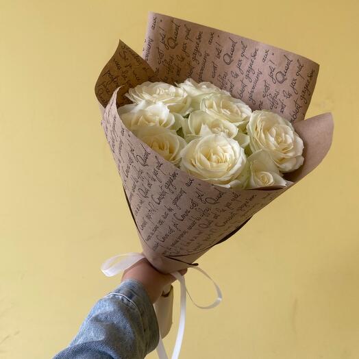 Bouquet of white roses in craft