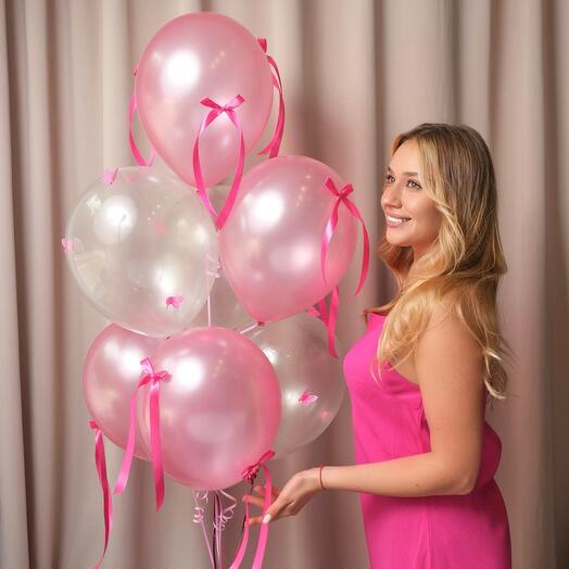 Fountain of pink balloons with butterflies and bows