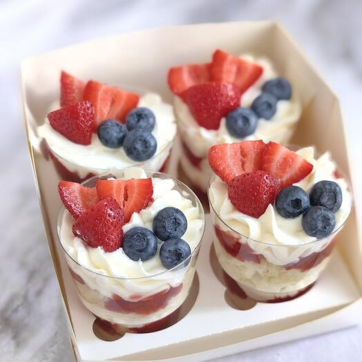 Trifles decorated with fresh berries as a gift vanilla with strawberries, fresh berry decor, a gift to mom