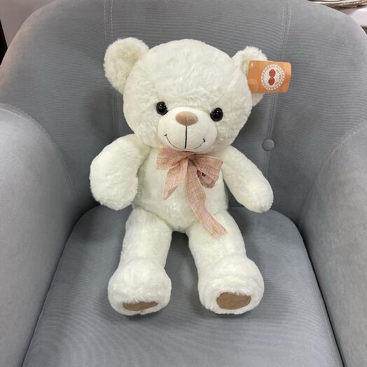 Белый мишка с бантиком