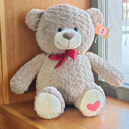 Коричневый медведь с бантиком